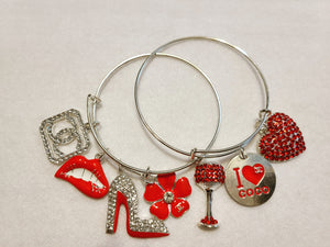 SILVER AND RED CHARM BRACELETS