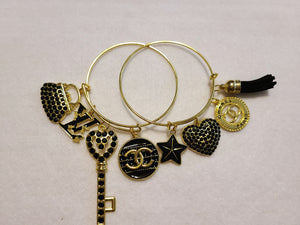 BLACK AND GOLD CHARM BRACELETS