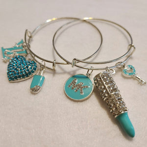 BLUE AND SILVER CHARM BRACELETS